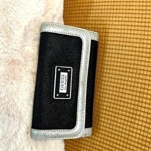 Black and silver guess wallet